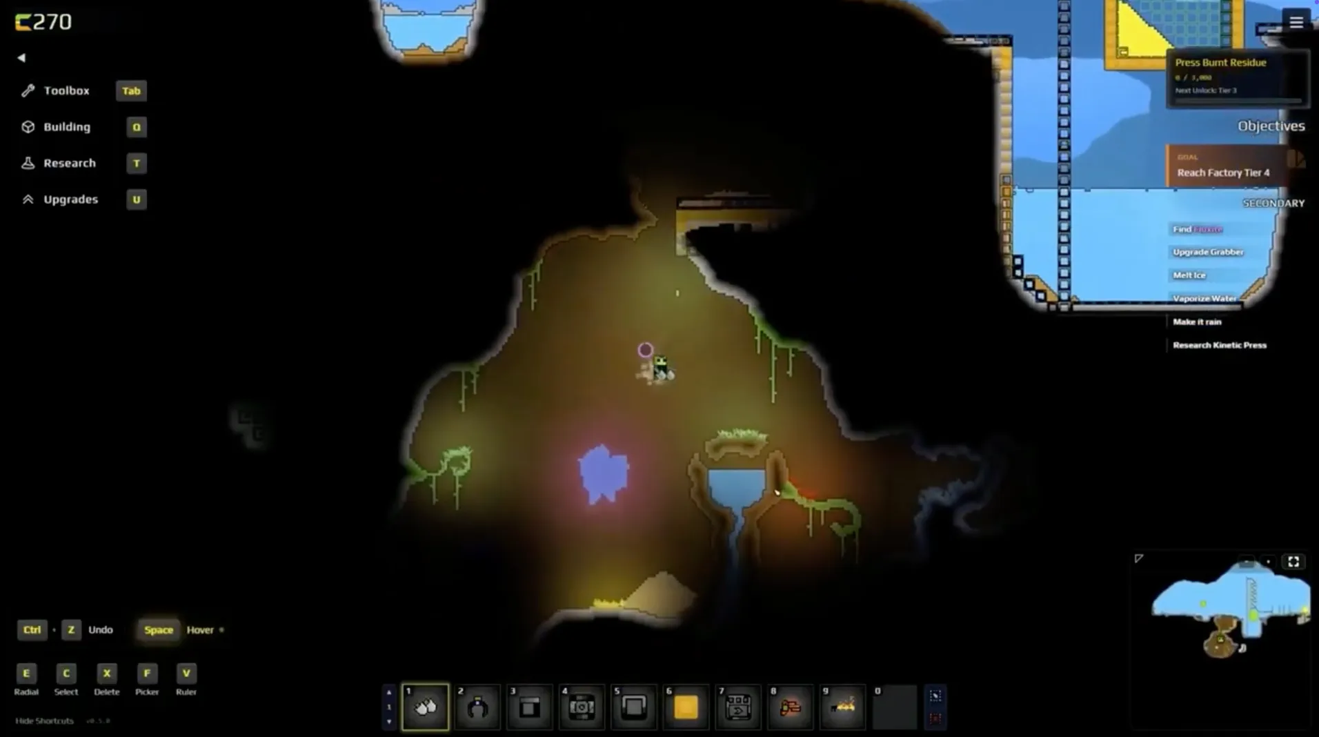 Sandustry gameplay: underground cavern with lava